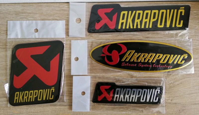 Akrapovic exhaust casing / fairing aluminum badges