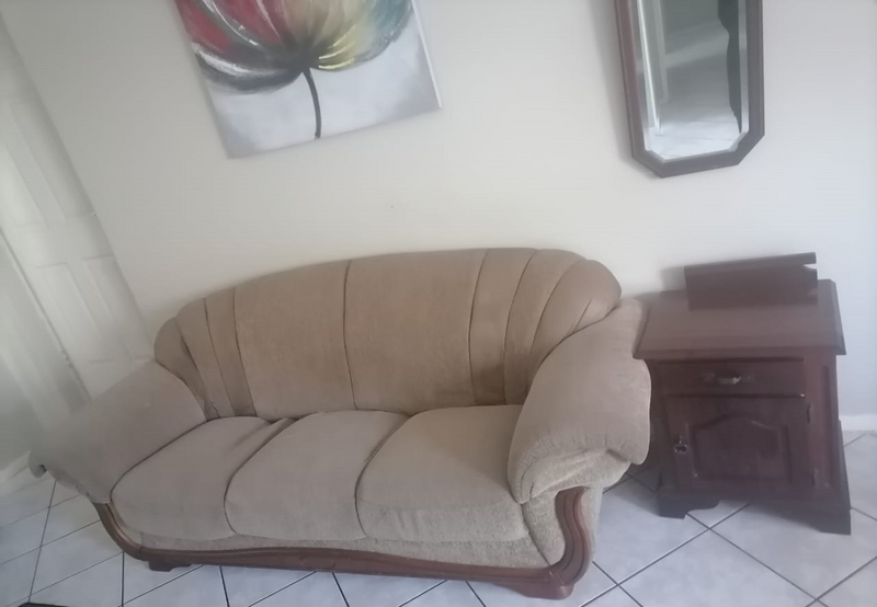 3- Seater beige couch for sale.