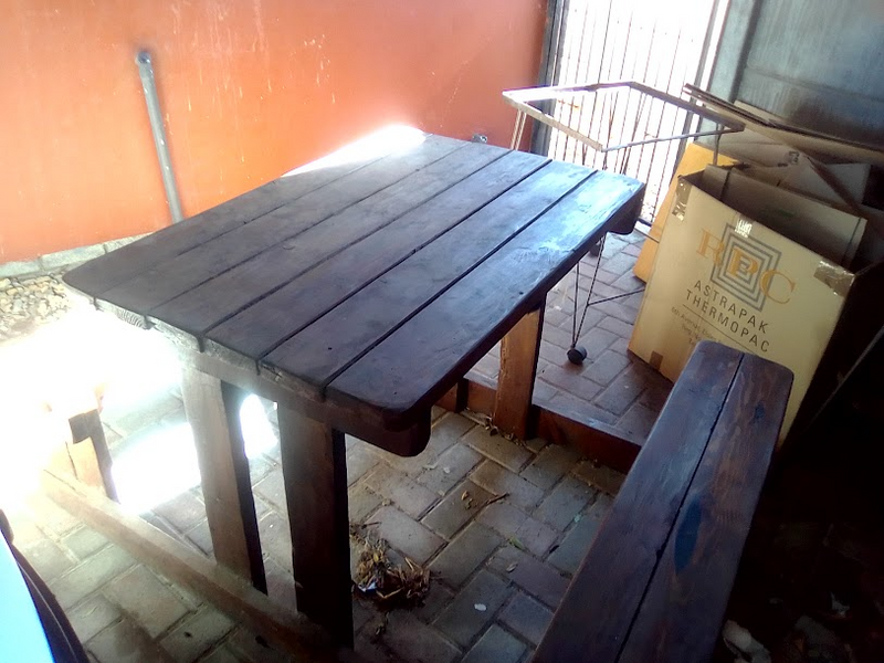 Wooden table with fixed seating for 4 plus