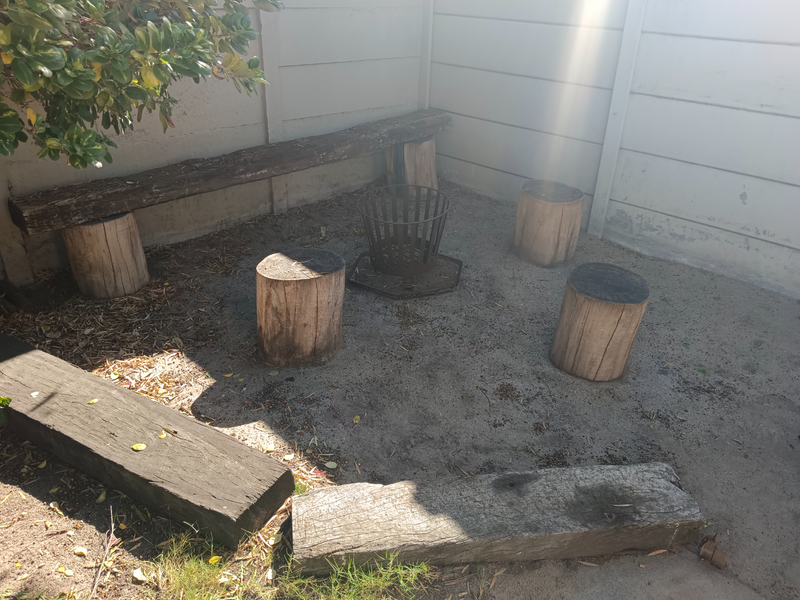 Wooden sleepers, tree stumps and Boma for outside braai area