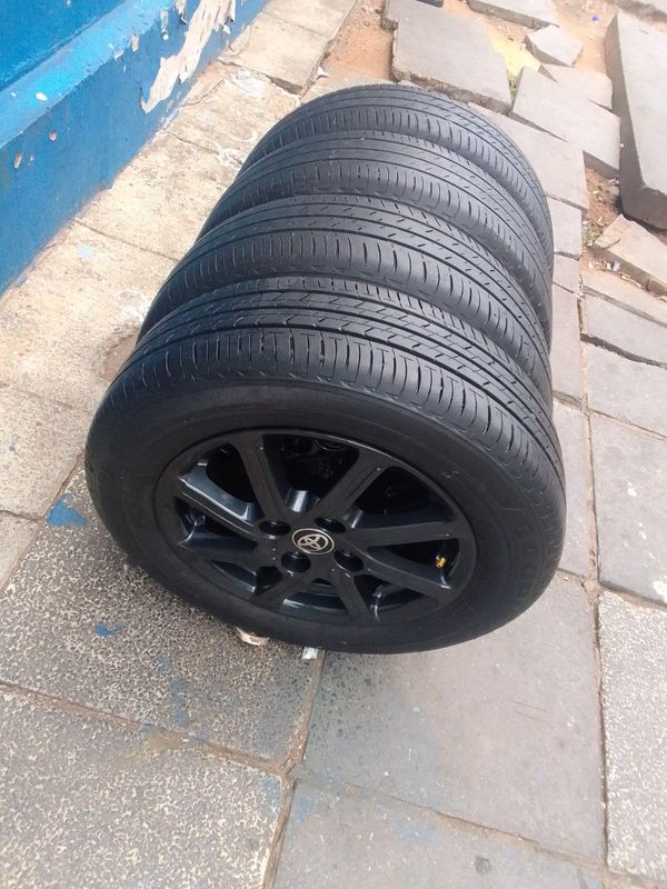 A set of 14inches original Toyota Agya mags rim 4x100 PCD with tyres. Also fit Chevrolet spark