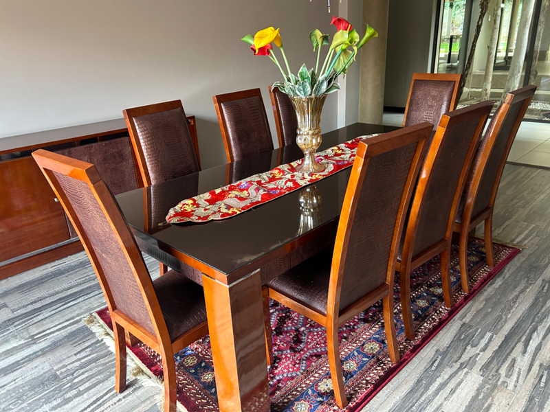 Dinner table with chairs and stand