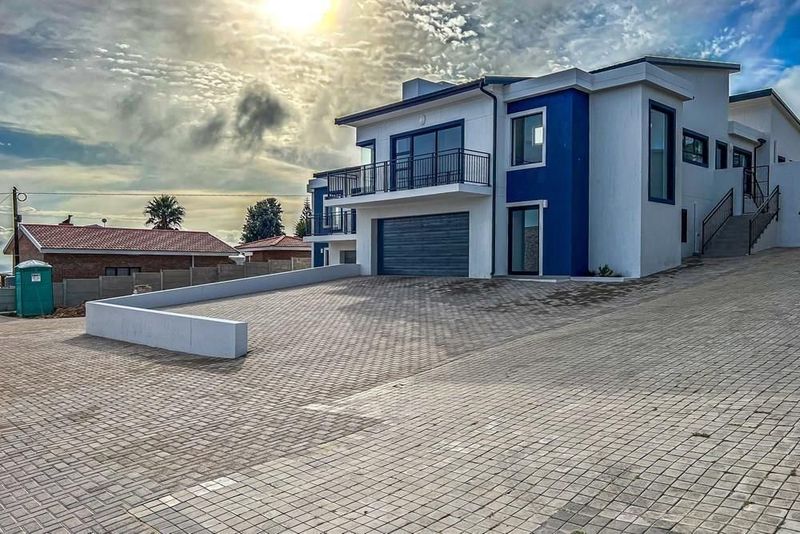 BRAND NEW EXQUISITE FAMILY HOME WITH OCEAN VIEWS