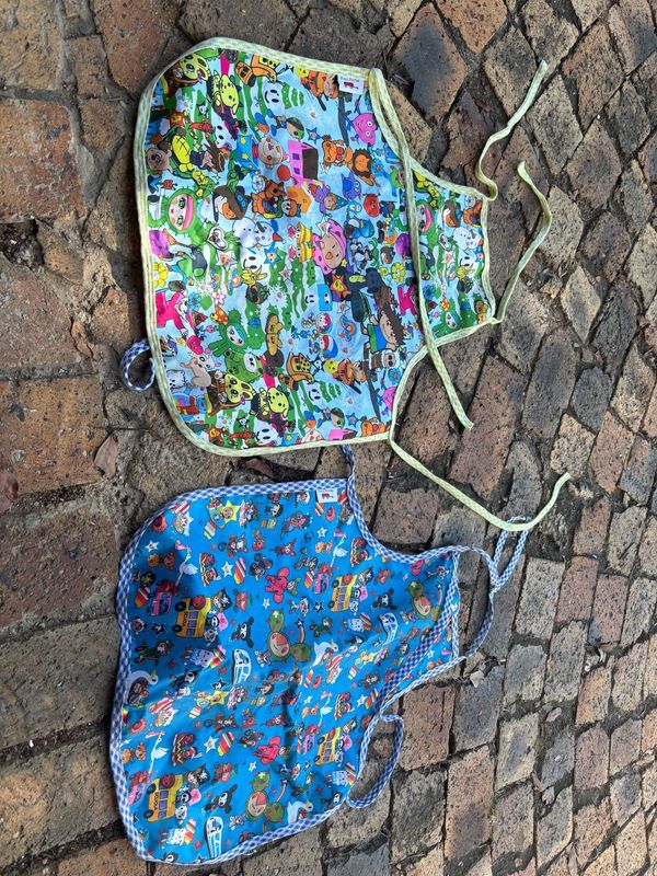 Two kids aprons age 8 to 11,sold as a set
