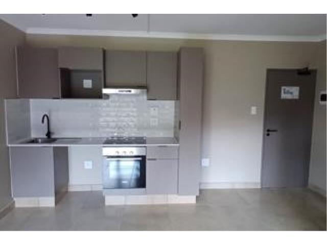 Lovely 1st floor unit with 1 bedroom and 1 bathroom with a shower toilet and basin
