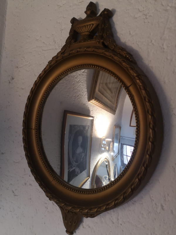 Mirror in gold frame