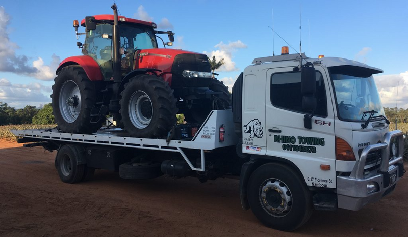 Tractor transport is our business 24/7--local/over border