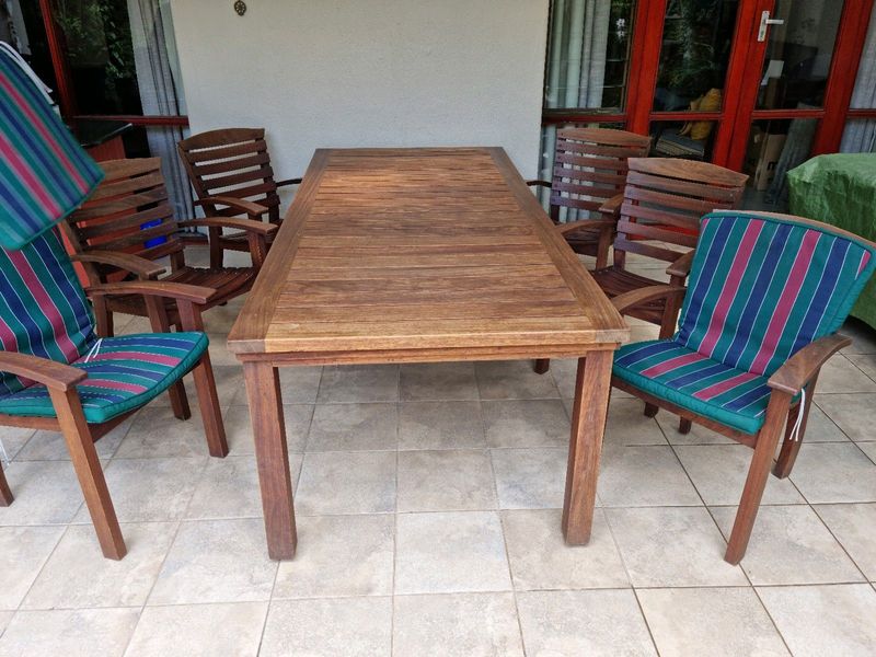 8 Seater solid Iroko wood patio table and chairs