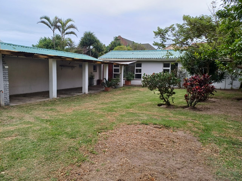 Lovely home with granny flat set in tranquil parklike garden to let in Gonubie. R13200.00pm