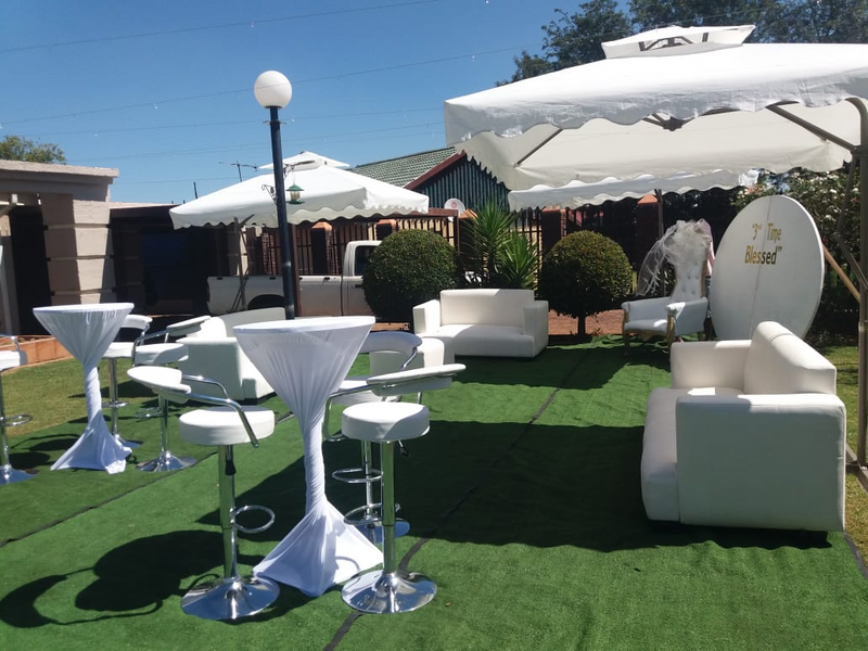 Garden Umbrellas hire. VIP couch lounge decor set up. Couches mix with cocktails decor. Bar tables.