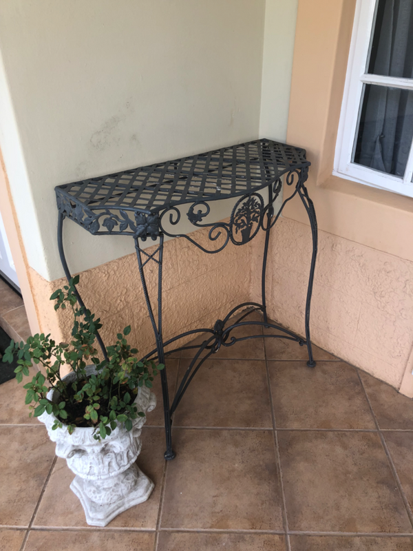 METAL HALF MOON TABLE WITH  INTRICATE DESIGN