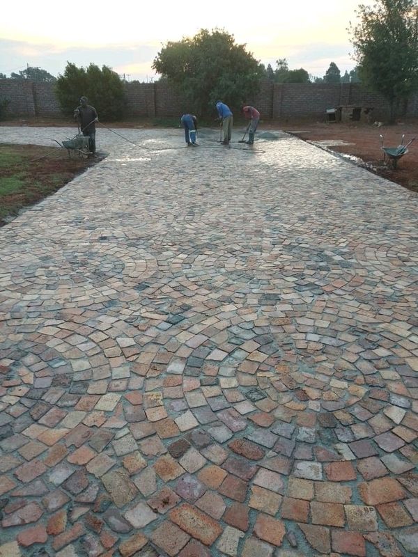 Cobble half brick paving and tar surfacing