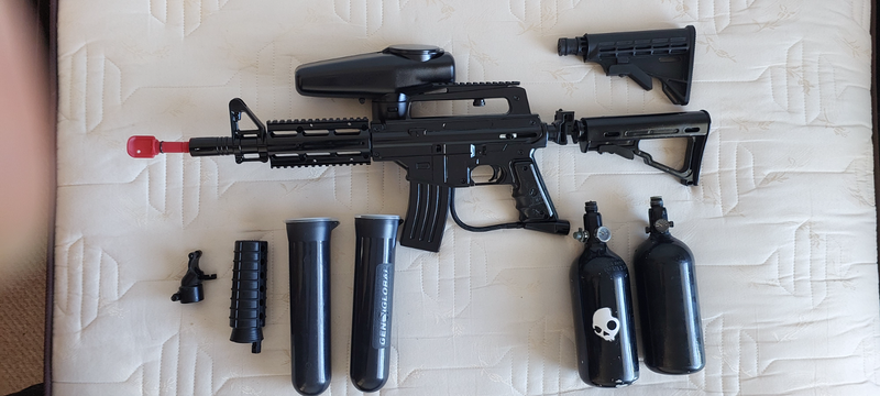Bravo 1 Paintball Marker with extras.