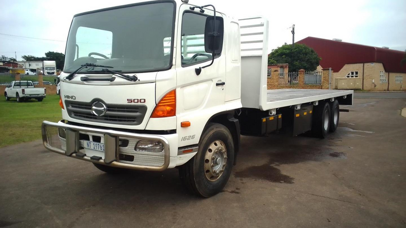 2012 Hino 500 1626 Flat Deck With Tag Lift Axle