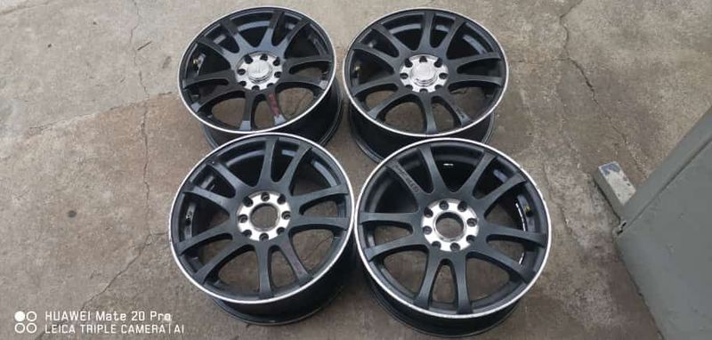 A clean set of 15inch golf rims pcd 4/100 available for sale