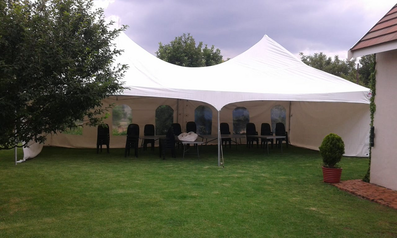 Tents hire, Stretch tents and Garden Umbrellas hire. Lounge couches set up mix with cocktails.