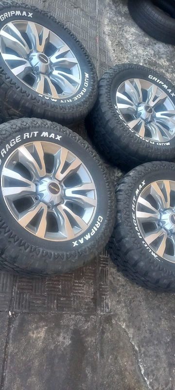 A set of 18&#34; mags and mud terrain tyres for isuzu x-rider