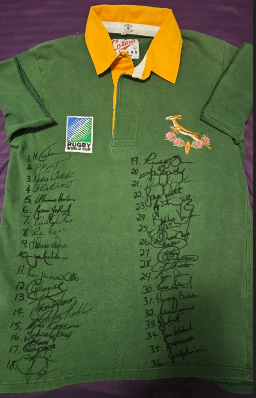 Rugby World Cup 1995 jersey signed by full squad and management