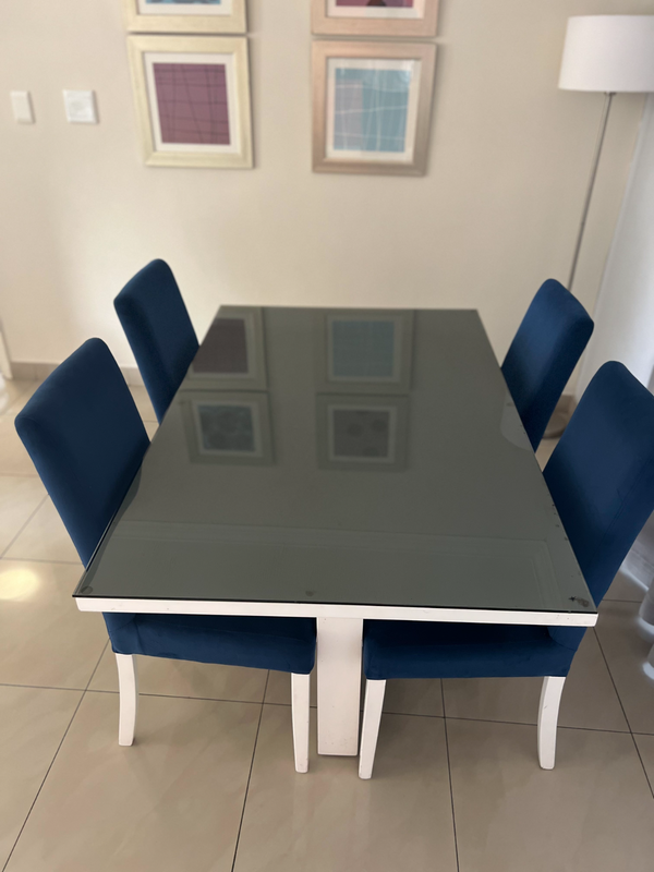 Dining Table with glass top and dining chairs