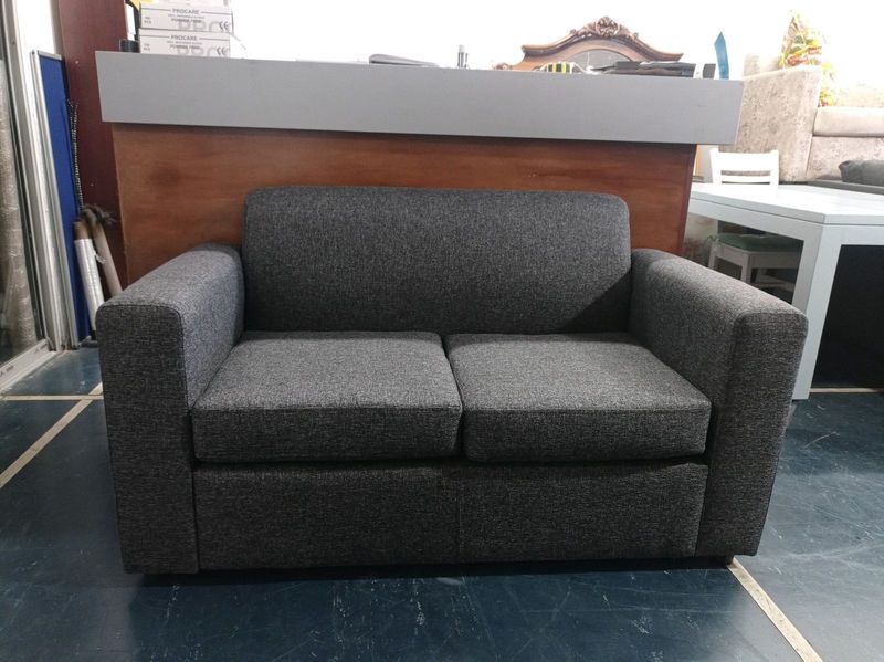 Two seater couch- grey/ black