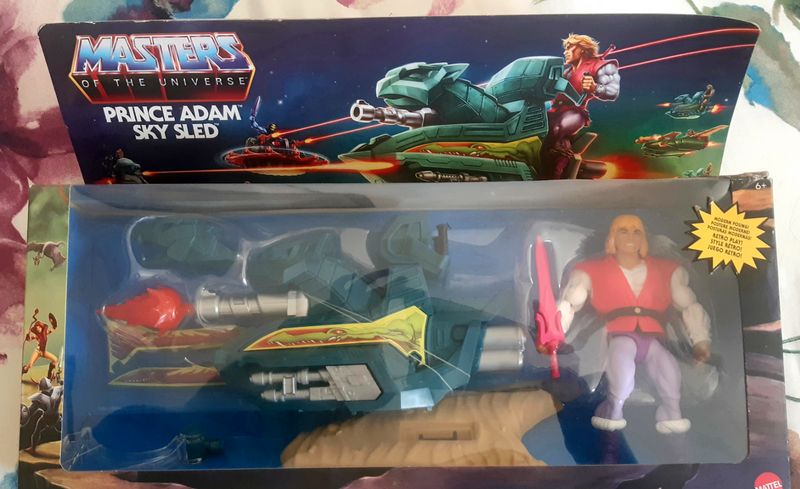 Masters Of The Universe Origins Prince Adam action figure with Sky Sled Vehicle in box