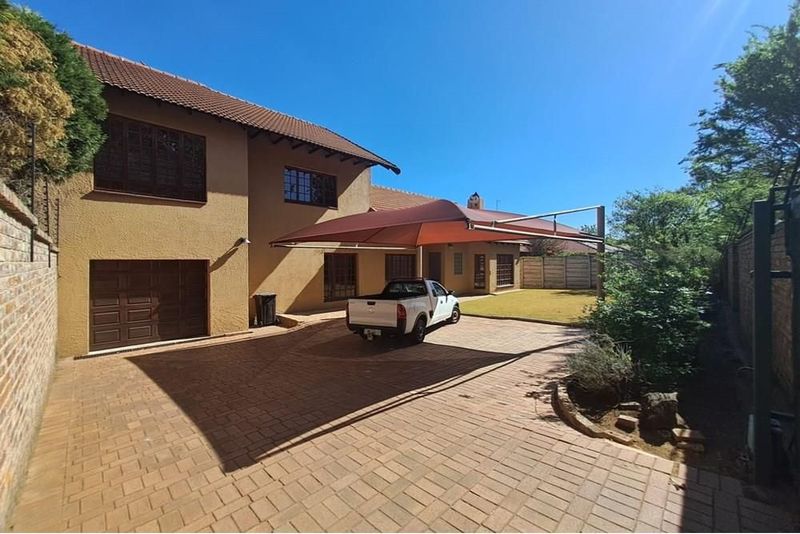 This stunning home boasts 4 spacious bedroom and a 2 bedroom flatlet