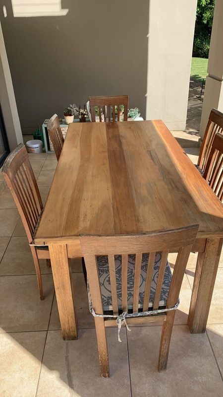 6 seater Hardwood table and chairs