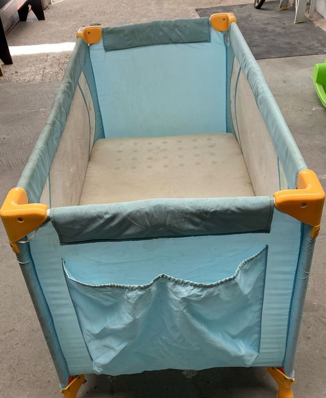 Playpen/cot for sale.
