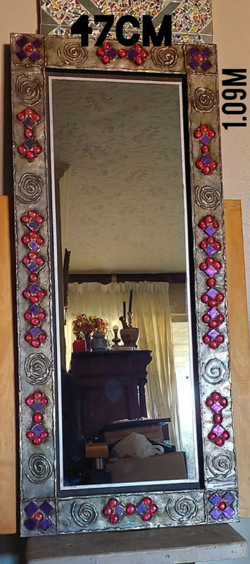 Pewter framed mirror