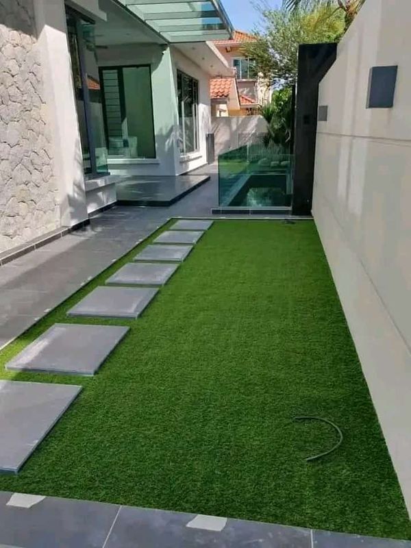Artificial grass and Slabs