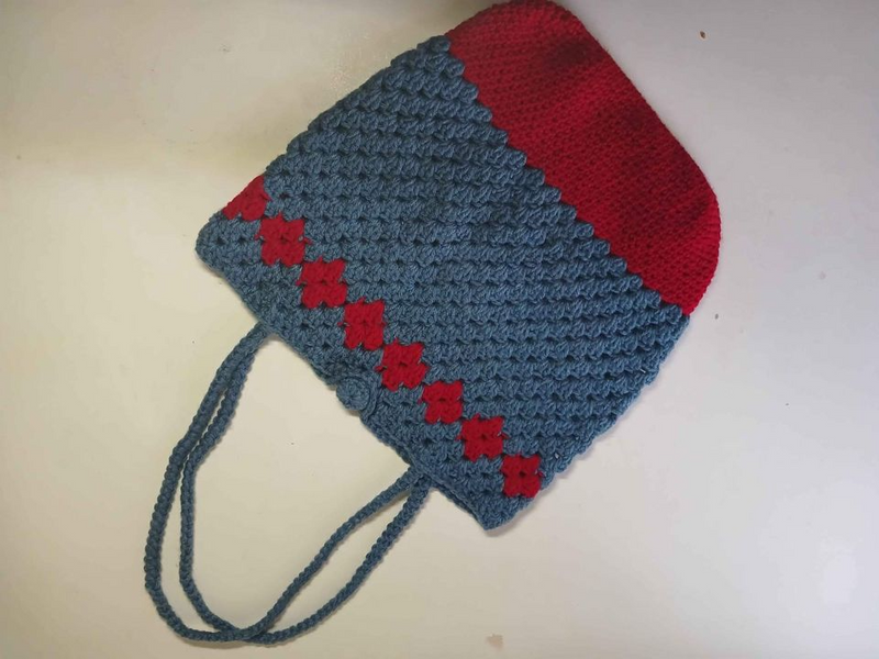 Blue and red crocheted handbag for sale