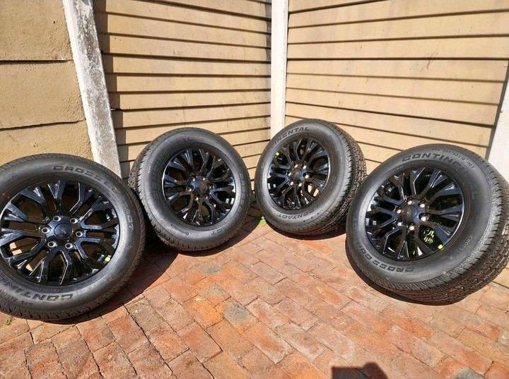 Brand new 265 60 18 continental croscontact tyres and 18&#34; ford thunder black rims