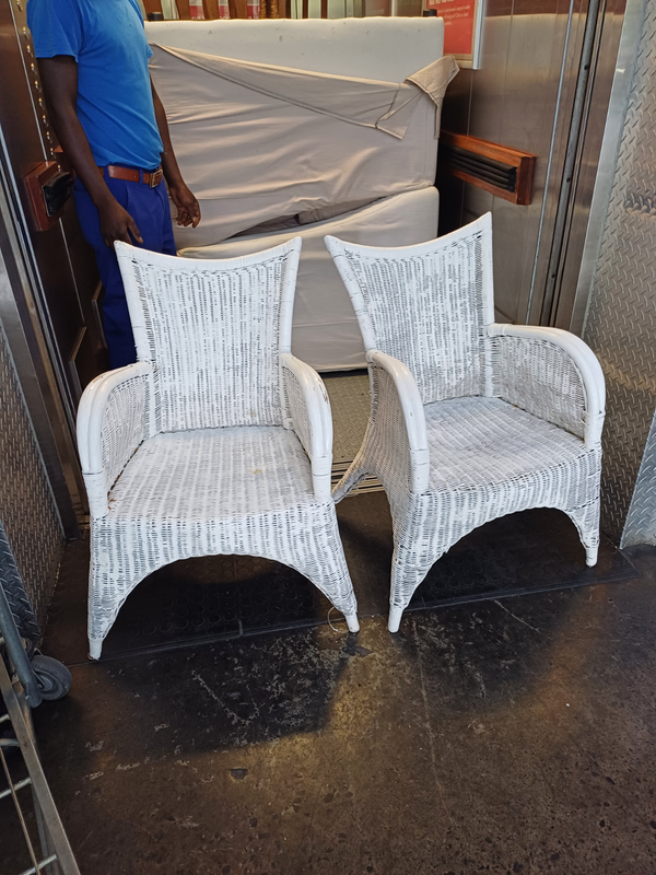 Two beautiful white washed Caine chairs