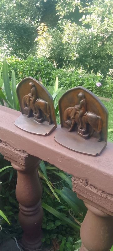 Horse and rider copper overlay bookends