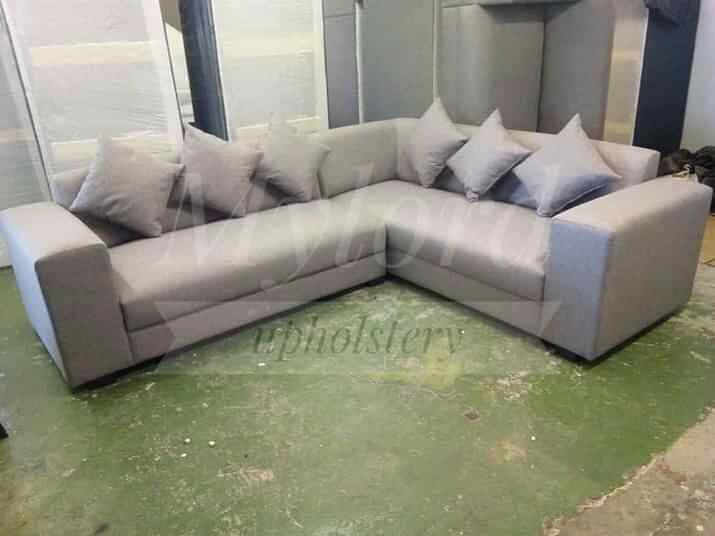 New grey L shape couch
