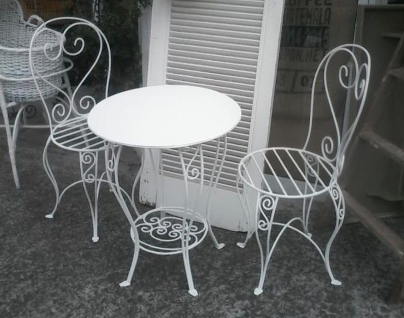 Fancy handcrafted table and 2 chairs
