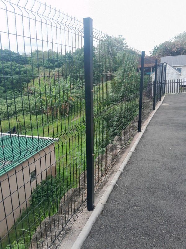 Razor wire and clearview fence installation.