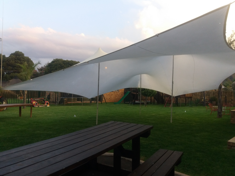 Small or big stretch tents hire, with chairs and tables.