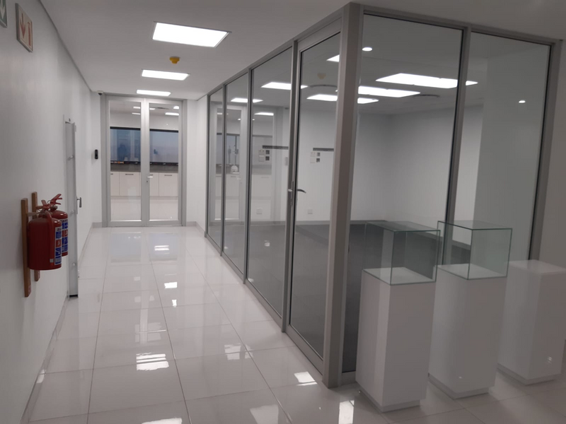 Frameless doors, windows and shop fronts