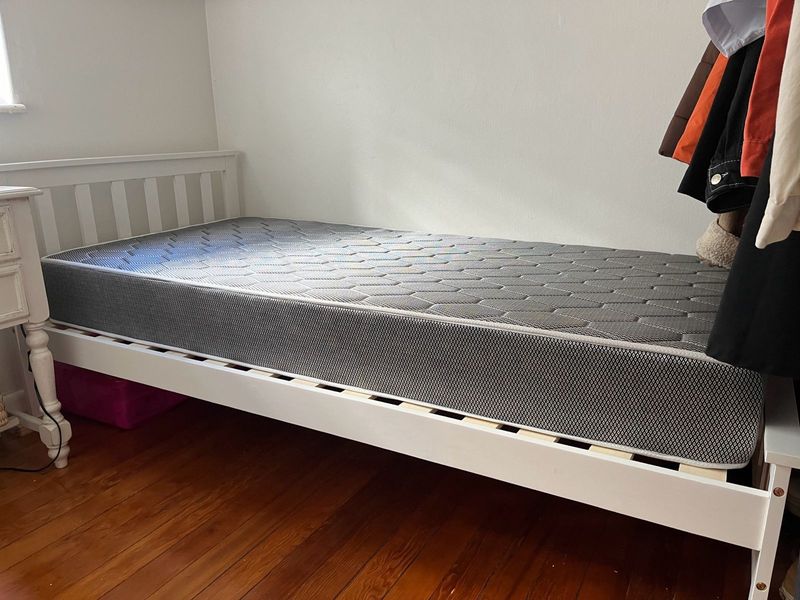 Single bed frame, single bed mattress, and bedding for sale! u s e d 3 4 t i m e s o n l y