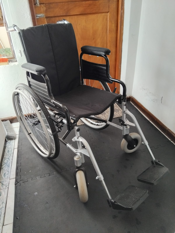 Wheelchair hardly used - large and light