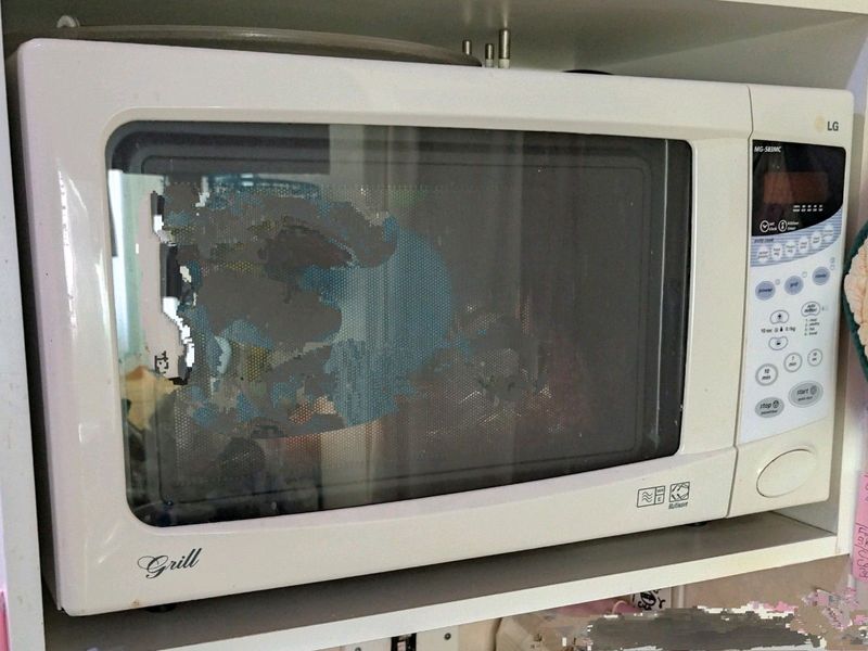 Microwave LG Stainless steel. NB.  Needs a new magnitron but the infrared convection oven works.
