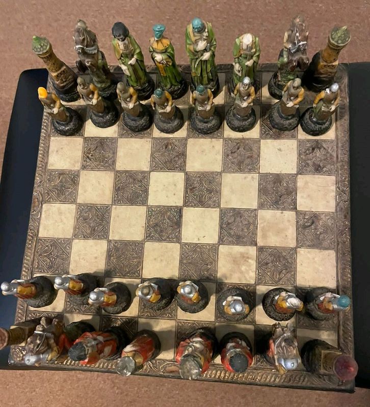 Ivory Chess set and plastic chess set see photos. 10 cm hight.Both for R200.