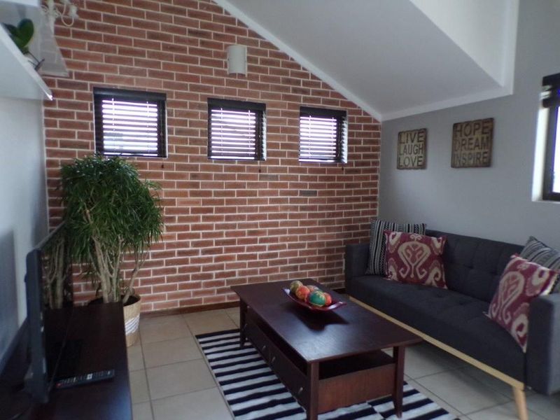 Beautiful semi-furnished loft unit with stunning view in the heart of Bryanston