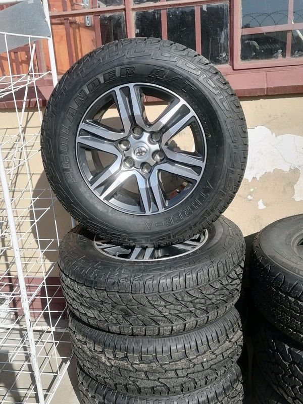 Toyota Hilux 17 inch diamond cut Mag Rims (WITH USED TYRES)