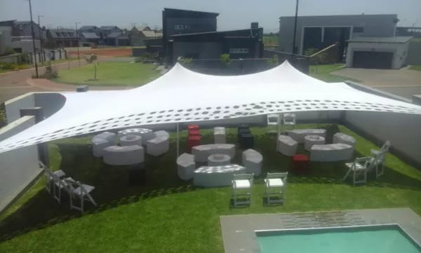 Outdoor furniture hire and decor. Garden umbrellas or Stretch tent with VIP couches and cocktails.
