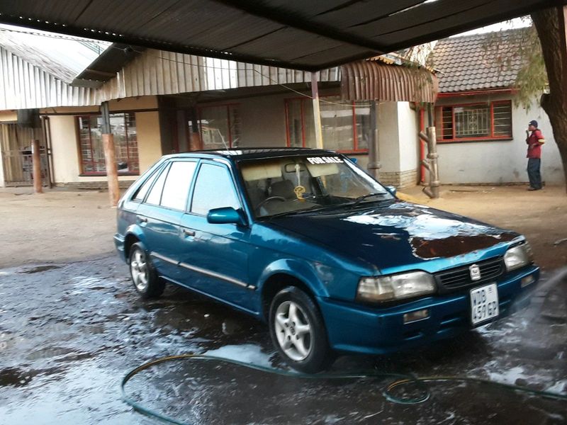 Ford/mazda 323 start an go very light on fuel!