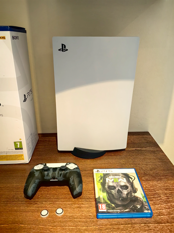 Ps5 console with one controller and mw2