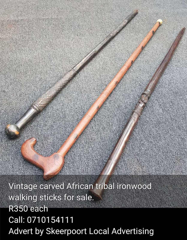 Vintage carved African tribal walking sticks for sale