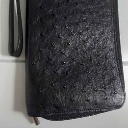 Genuine Black ostrich leather, passport, travel wallet.